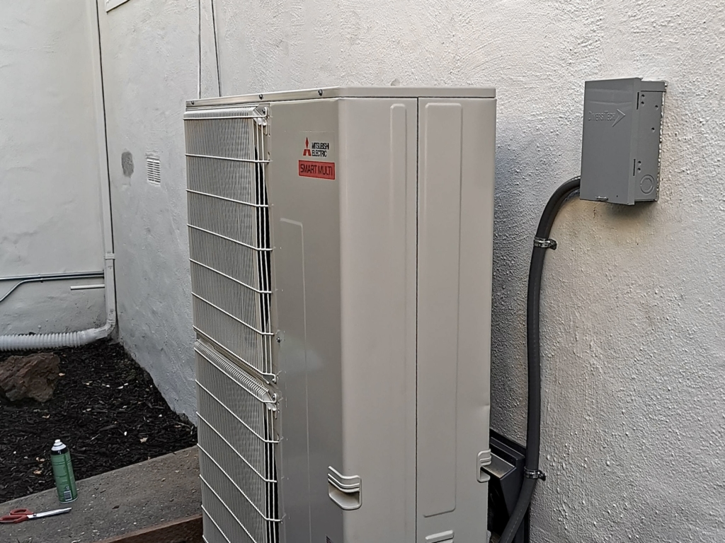 Mitsubishi MXZ-SM60NAM-U1 outdoor heat pump unit installed by Nur HVAC