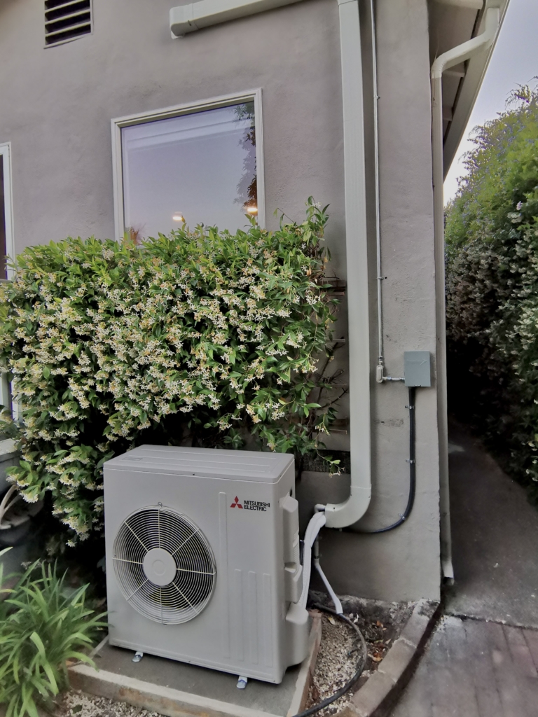 Mitsubishi SUZ-KA36NA outdoor heat pump unit installed by Nur HVAC