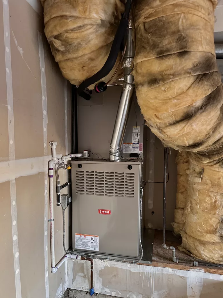 Hey there, HVAC enthusiasts! We had the privilege of installing the cutting-edge Bryant Furnace 821TA66135V24 for our awesome customer, and we couldn't be more thrilled to share the experience with you! This Bryant furnace is the definition of efficiency and comfort. With its advanced technology, it promises to keep our customers cozy and warm during the coldest winter nights. Key Features: 1. High Efficiency: say goodbye to high energy bills. This furnace delivers outstanding performance with lower fuel consumption. 2. Quiet Operation: no more disruptive clanks and bangs - this Bryant furnace operates with minimal noise, ensuring a peaceful environment. 3. Improved Air Quality: equipped with a top-notch air filtration system, it ensures that the air inside our customer's home remains clean and healthy. 4. Durability: built to last, this furnace is a long-term investment in home comfort. Our customers are now ready to embrace the upcoming winter with open arms. Do you want too? Got any questions about this Bryant furnace or HVAC needs of your own? Feel free to contact us!