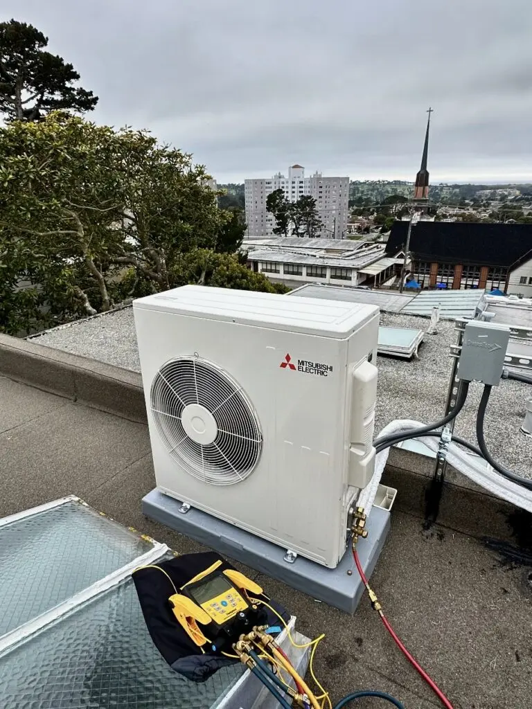 Mitsubishi SUZ-KA30N heat pump installed on the roof by Nur HVAC