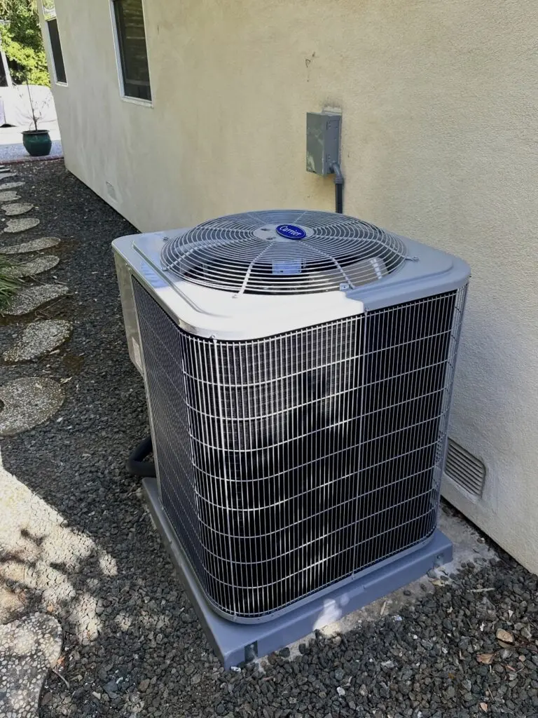 Carrier 24SCA560W003 air conditioner and Carrier 58SB1A110E2120 furnace installed by Nur HVAC