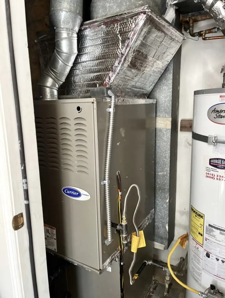 Carrier 38MURAQ60AA3 heat pump dual fuel system installed by Nur HVAC