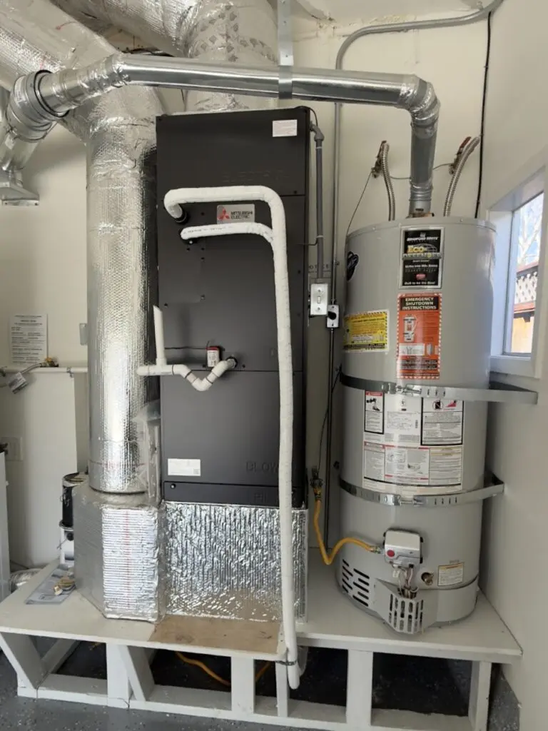 Mitsubishi MXZ-SM36 outdoor heat pump unit installed by Nur HVAC