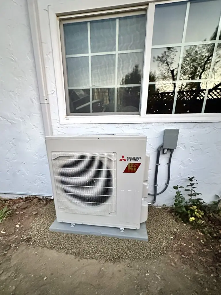 Mitsubishi MUZ-FS15NA outdoor heat pump unit installed by Nur HVAC