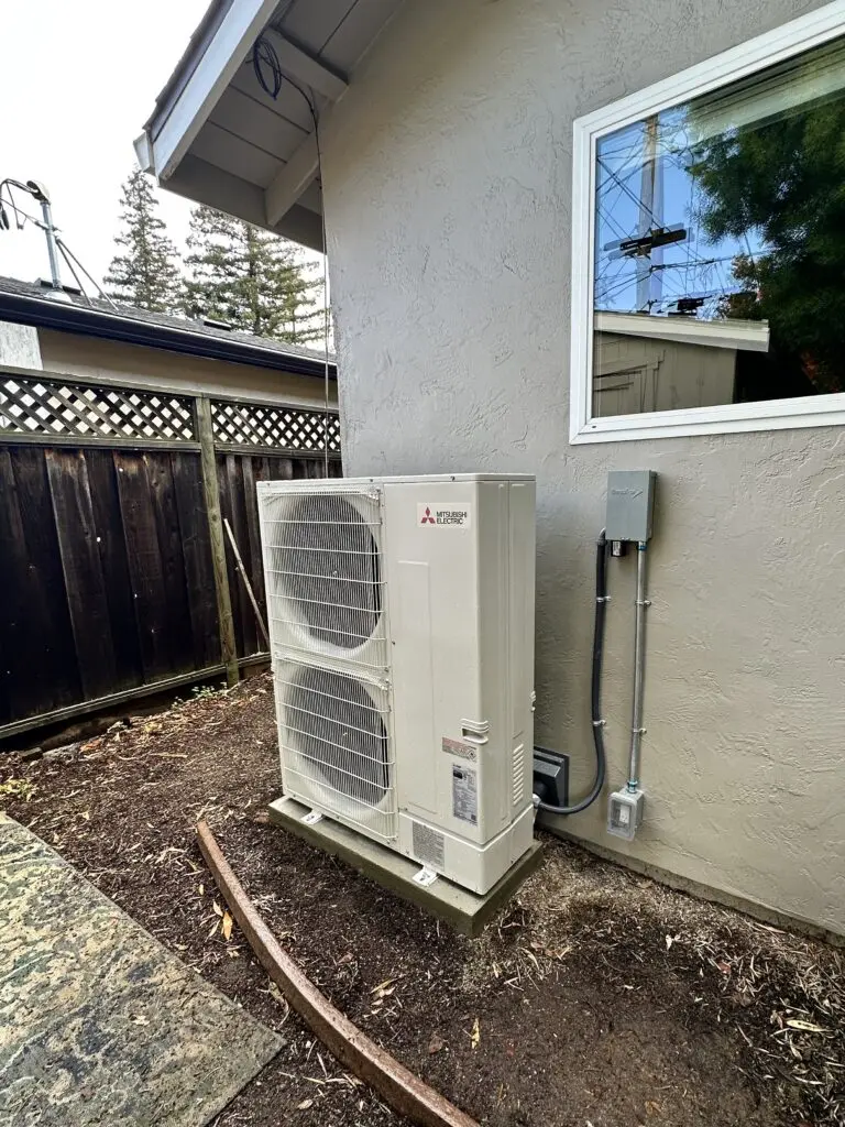 Mitsubishi PUZ-AK36NL heat pump outdoor unit installed by Nur HVAC