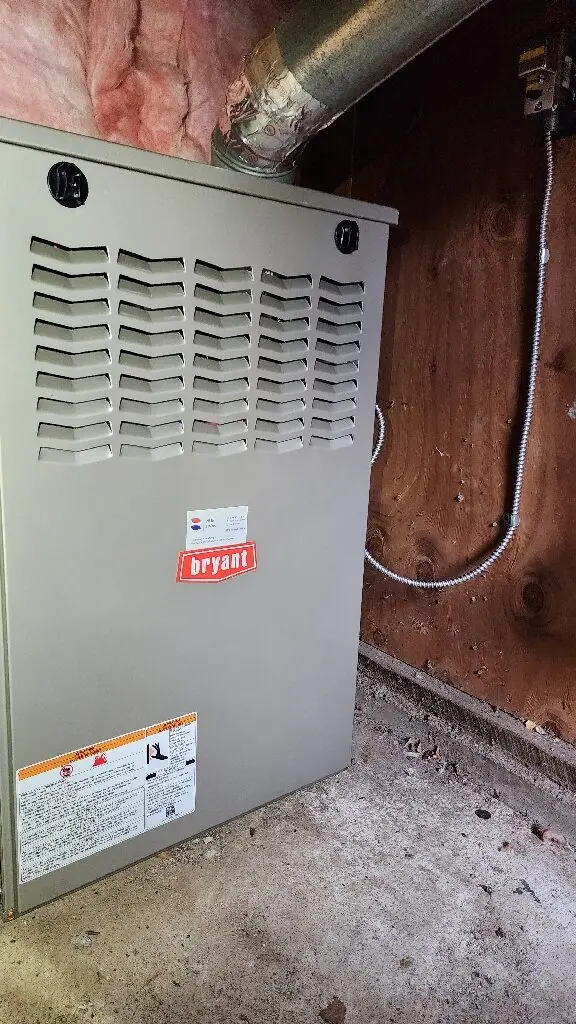Bryant furnace replacement in a Belmont crawlspace by Nur HVAC
