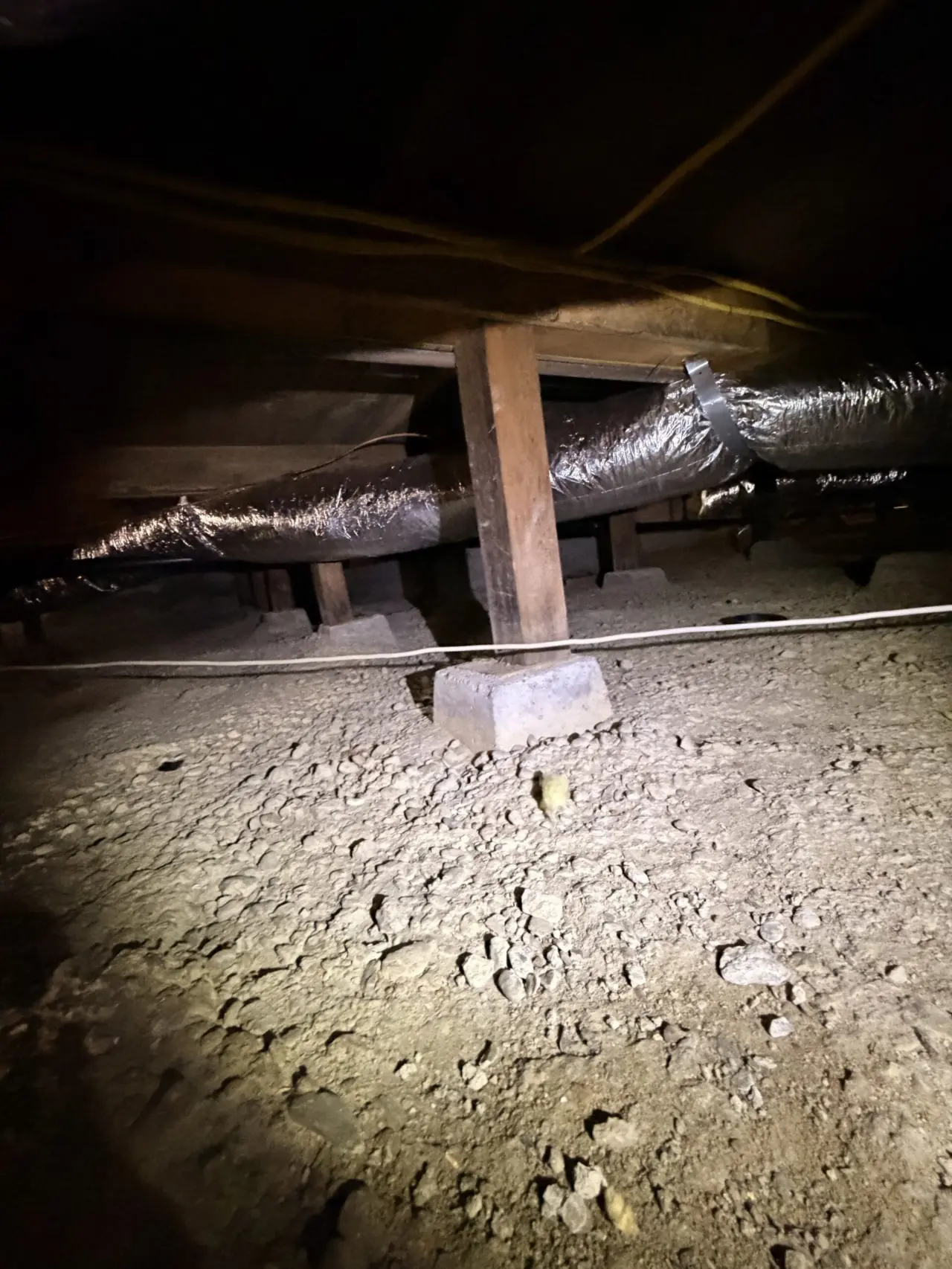 New insulated supply ducts running along the crawlspace joists in San Bruno