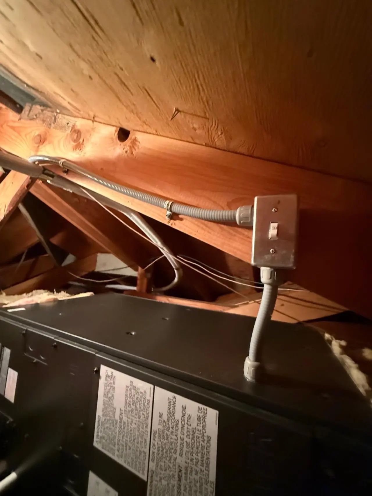 Mitsubishi heat pump air handler and new electrical disconnect installed in a Palo Alto crawlspace
