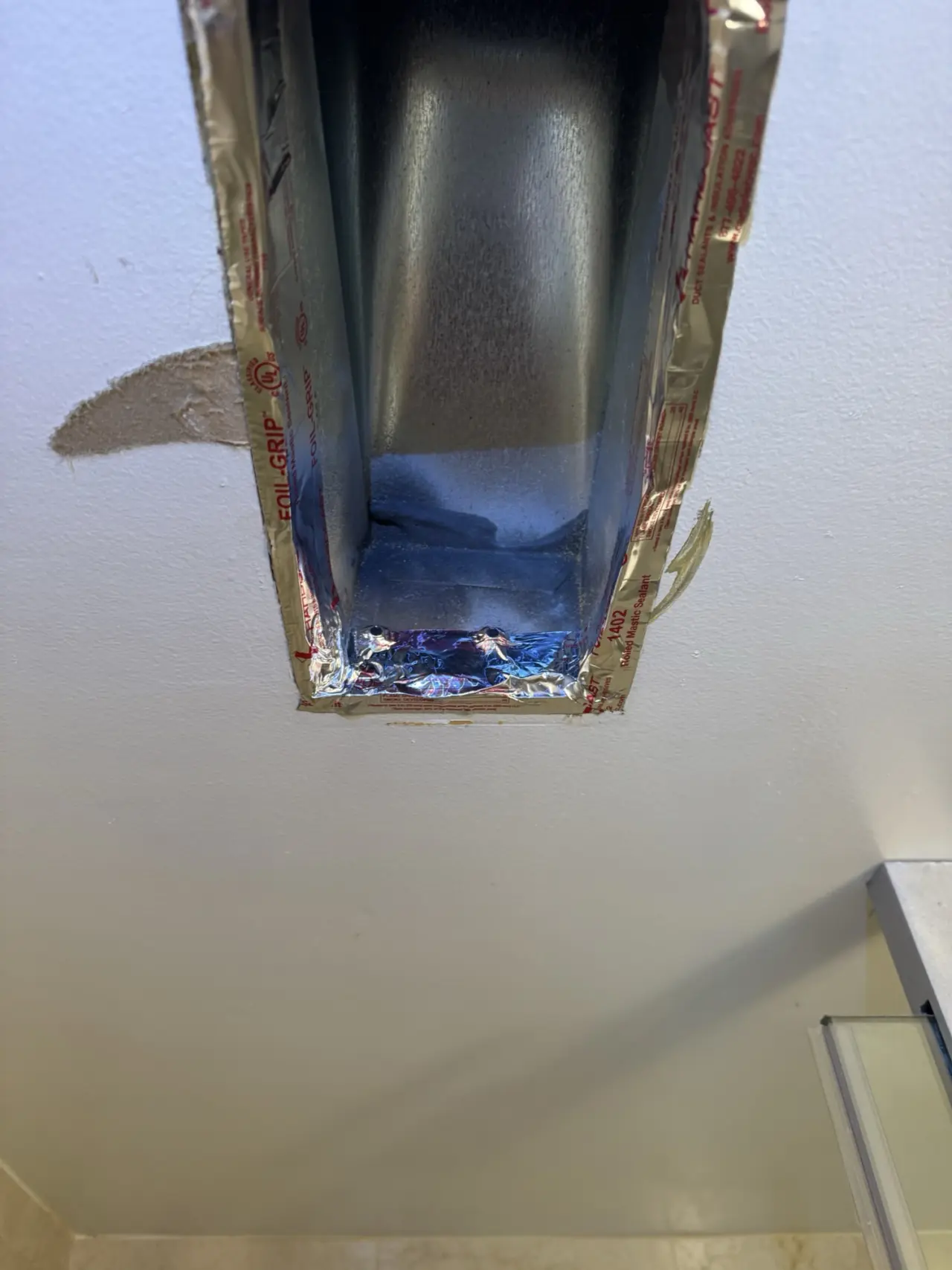 Sealed supply duct connection for a Mitsubishi heat pump zone in San Francisco