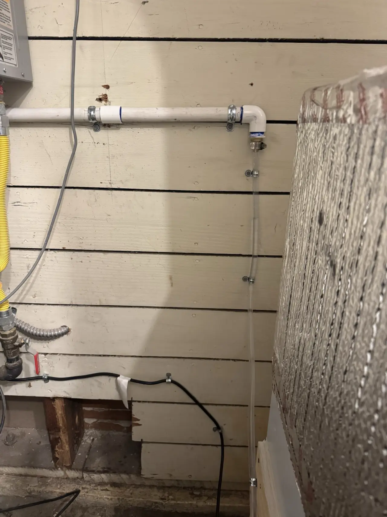 Refrigerant lineset and condensate routing for a Mitsubishi heat pump in San Francisco