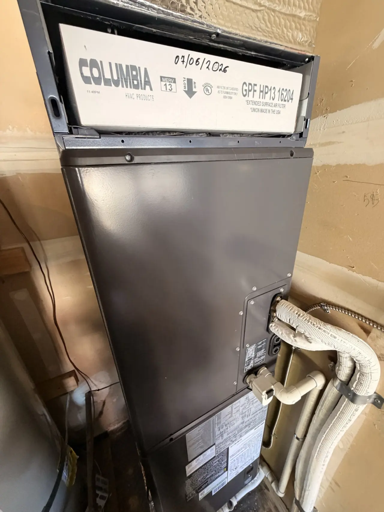 Carrier heat pump air handler and insulated refrigerant linesets installed inside a Sunnyvale home
