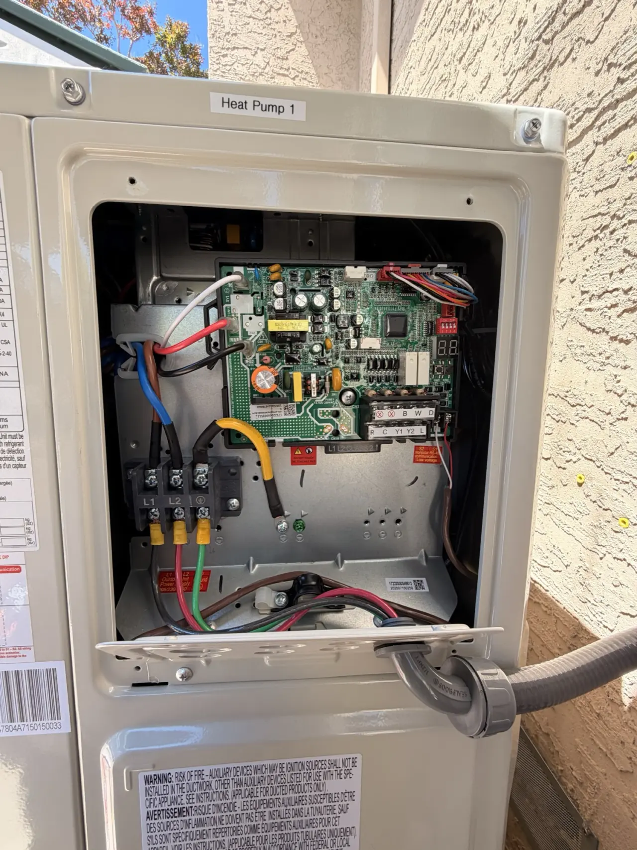 Carrier heat pump control board and outdoor disconnect wiring during installation in Sunnyvale