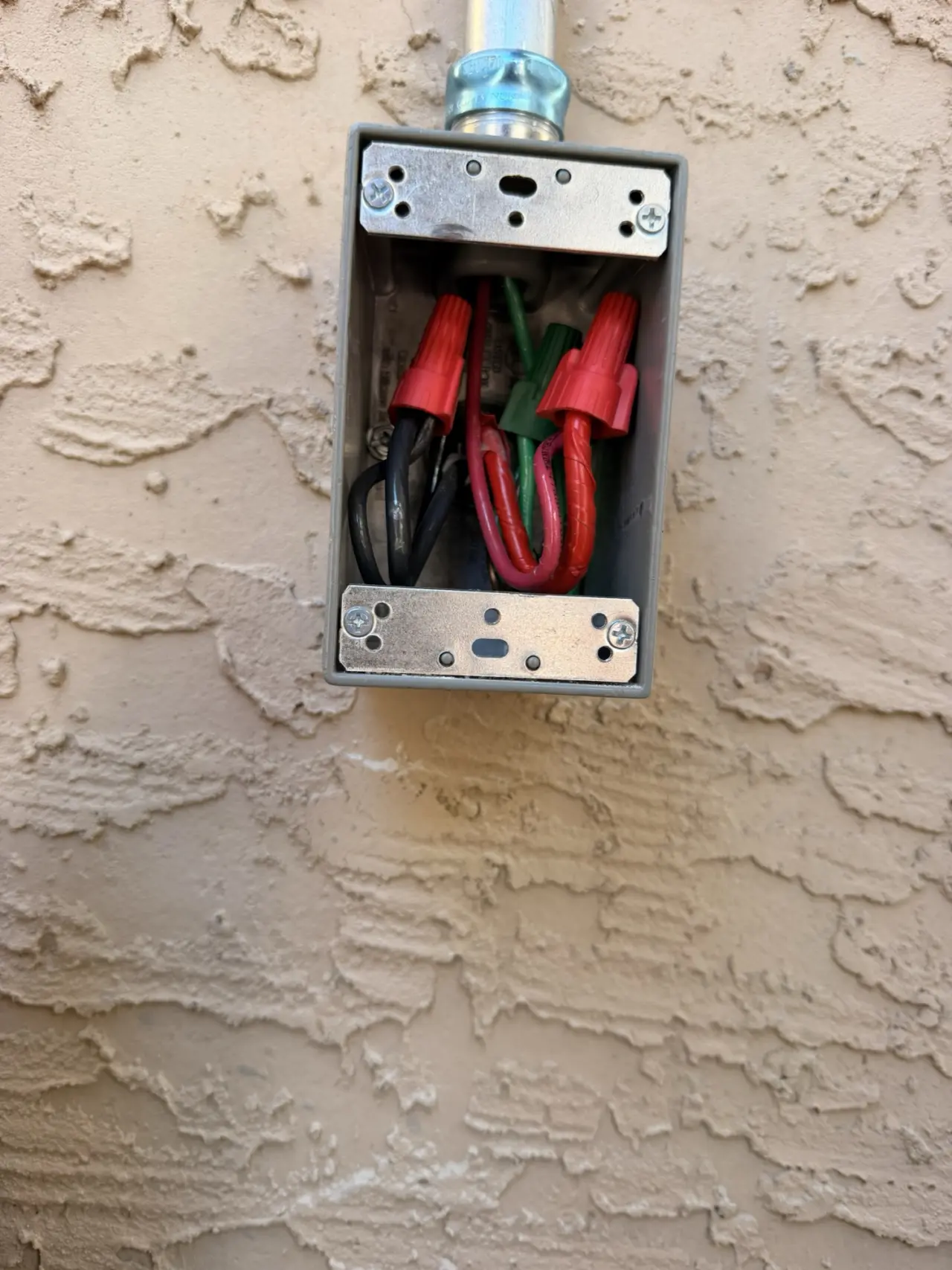 Weatherproof outdoor electrical junction box wired for a Sunnyvale heat pump system