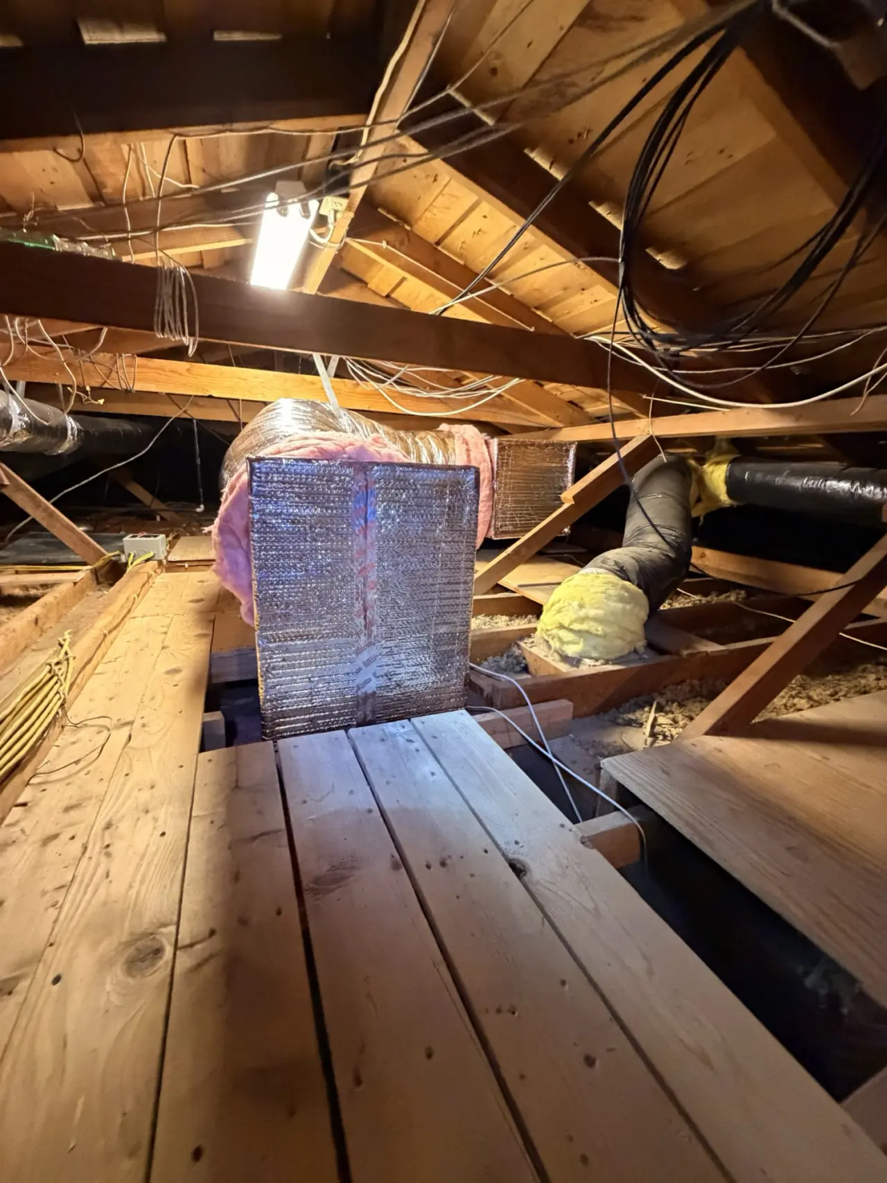 New insulated supply plenum and flex ductwork for a Carrier heat pump in San Mateo