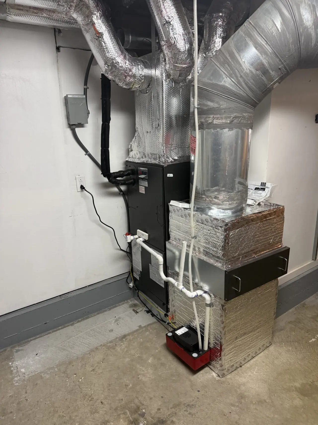 Mitsubishi air handler and sealed ductwork installed inside a San Francisco home