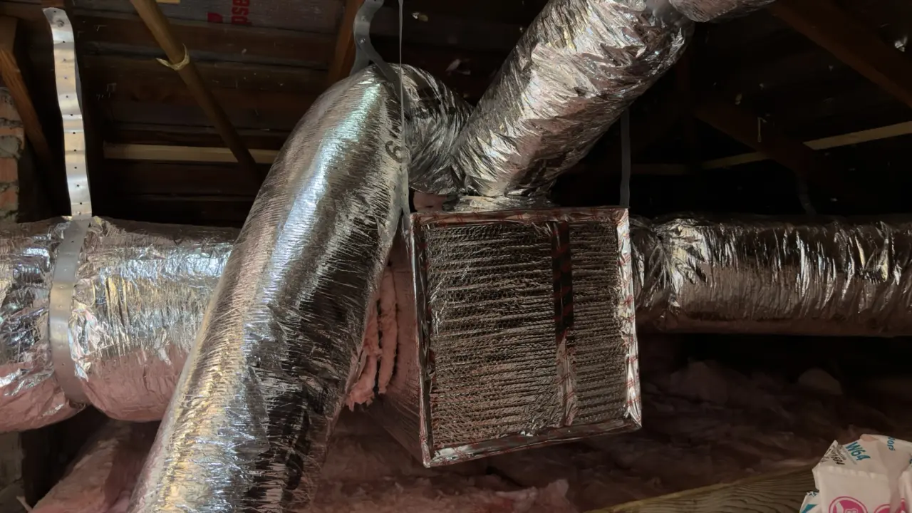 Insulated supply plenum and flex duct connections for a Carrier heat pump in Palo Alto