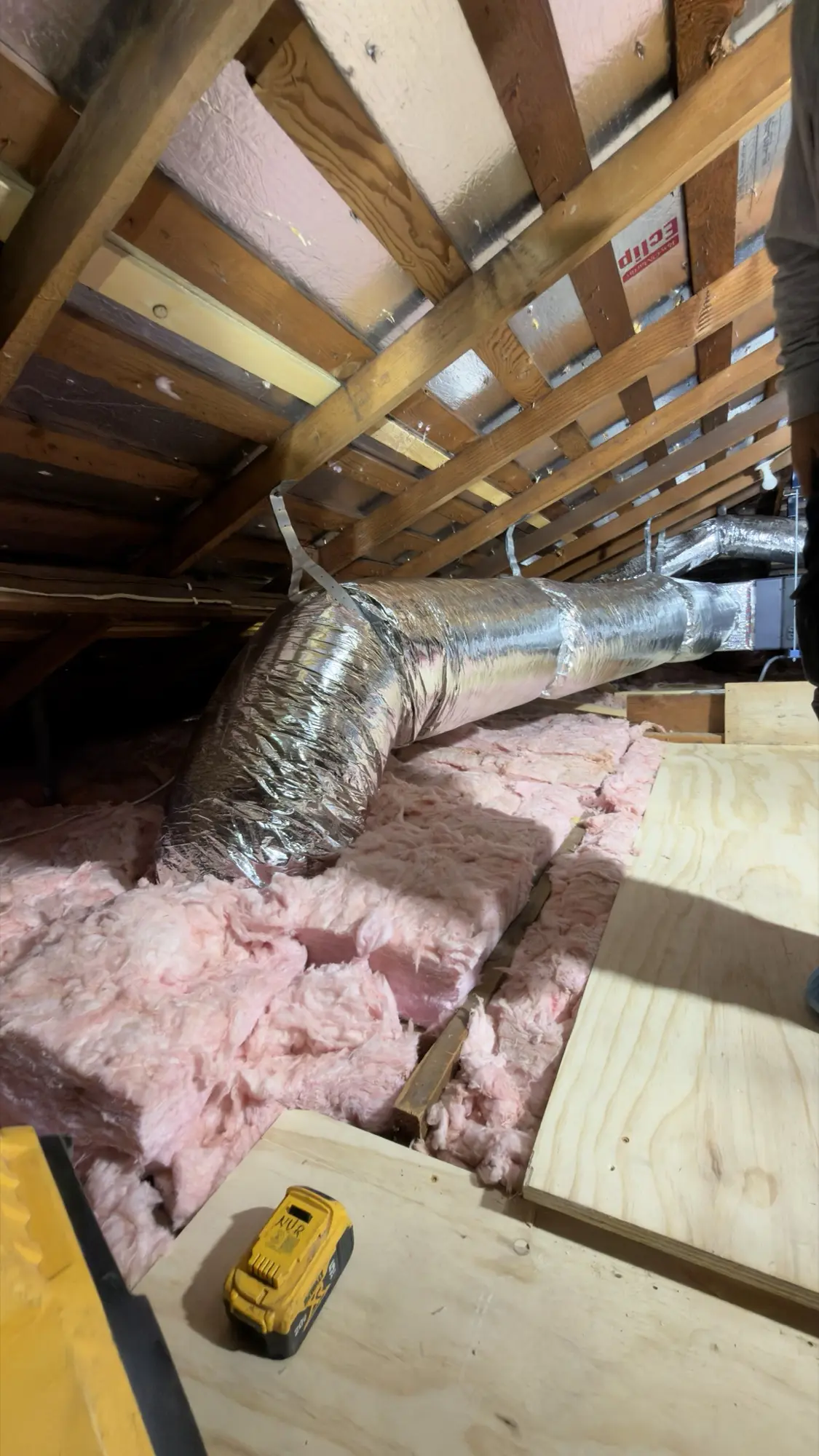 Finished flex duct run and Nur HVAC tools during a Palo Alto heat pump installation