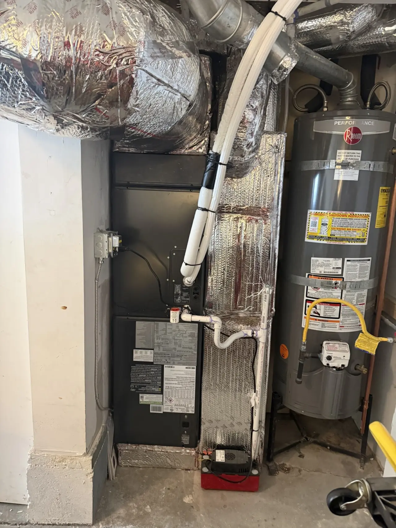 Carrier air handler and ductwork installed in a San Francisco mechanical room