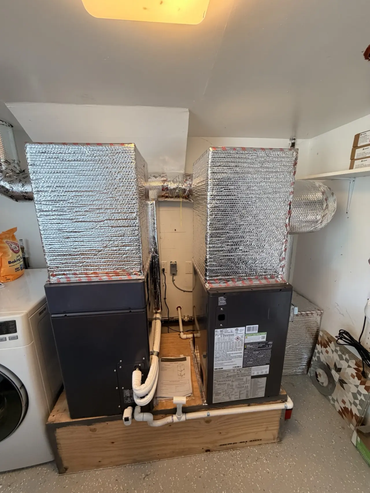 Matched Carrier air handlers with insulated supply plenums installed in a San Mateo home