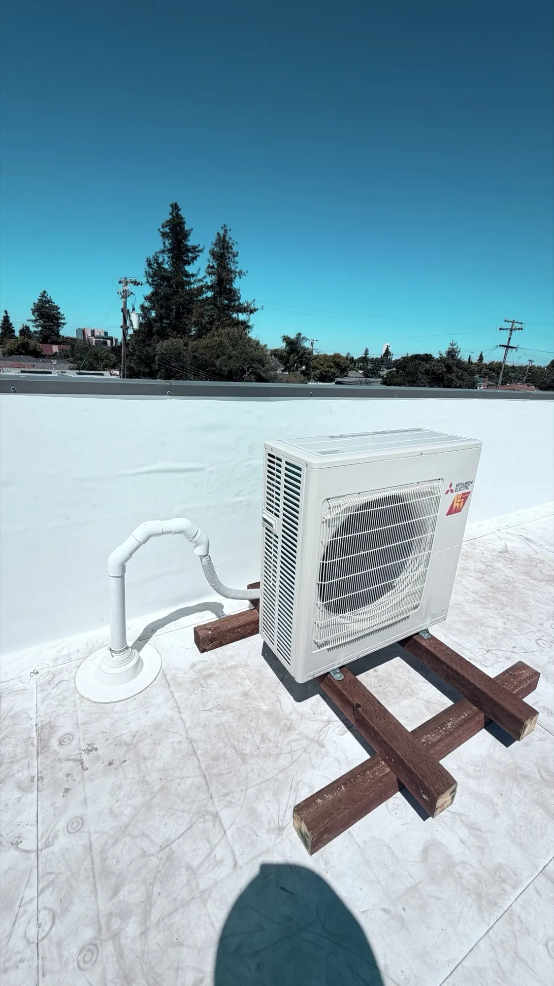 Insulated refrigerant lineset connected to a Mitsubishi mini-split condenser in Redwood City