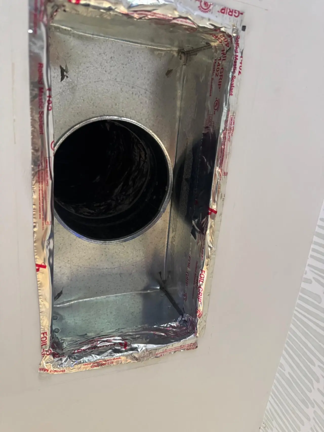 Sealed supply duct connection for a Carrier heat pump in Redwood City