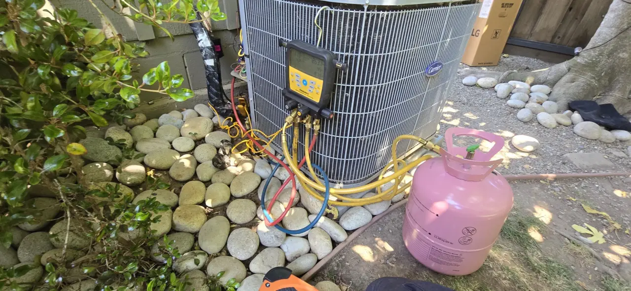 Outdoor AC condenser recharged after a new compressor was installed in San Carlos