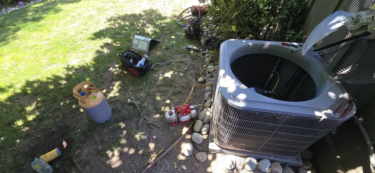 Vacuum pump and refrigerant recovery during a compressor replacement in San Carlos