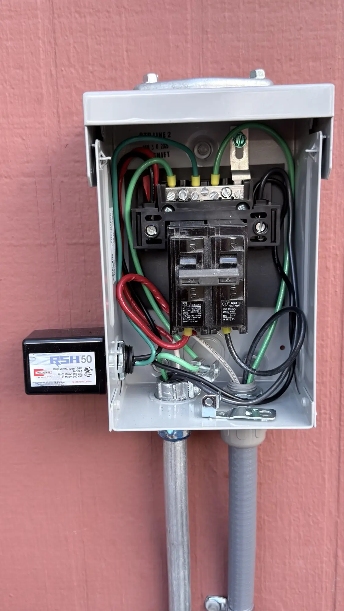 New electrical disconnect and surge protector for a Carrier heat pump in Mountain View