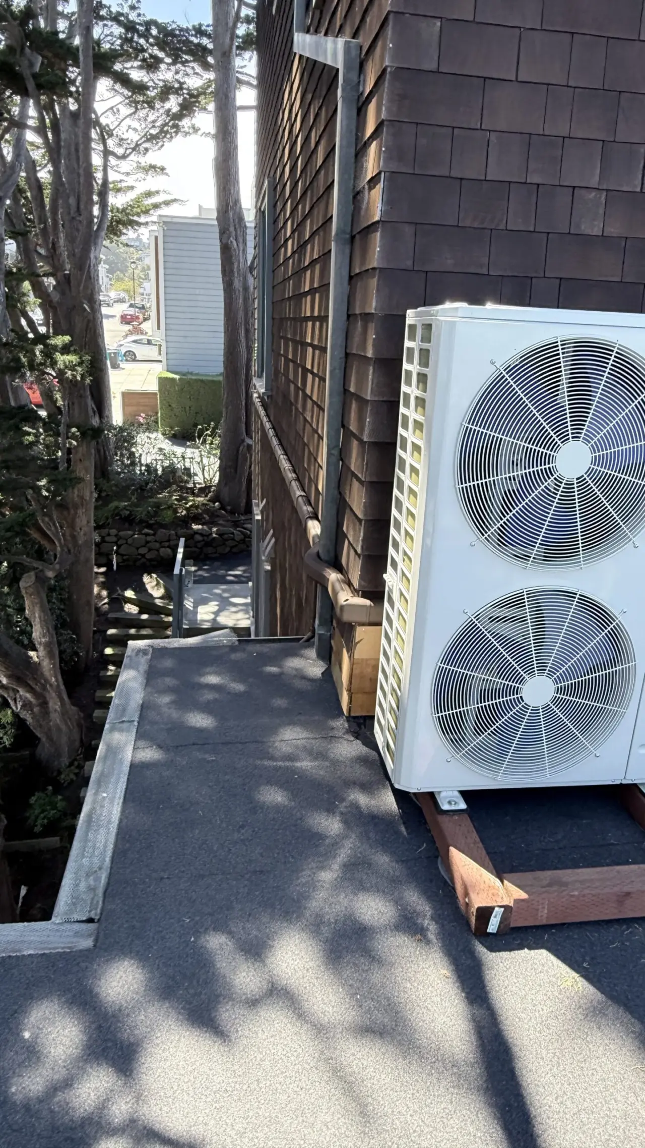 Carrier heat pump unit set on a raised platform on the rooftop deck, San Francisco