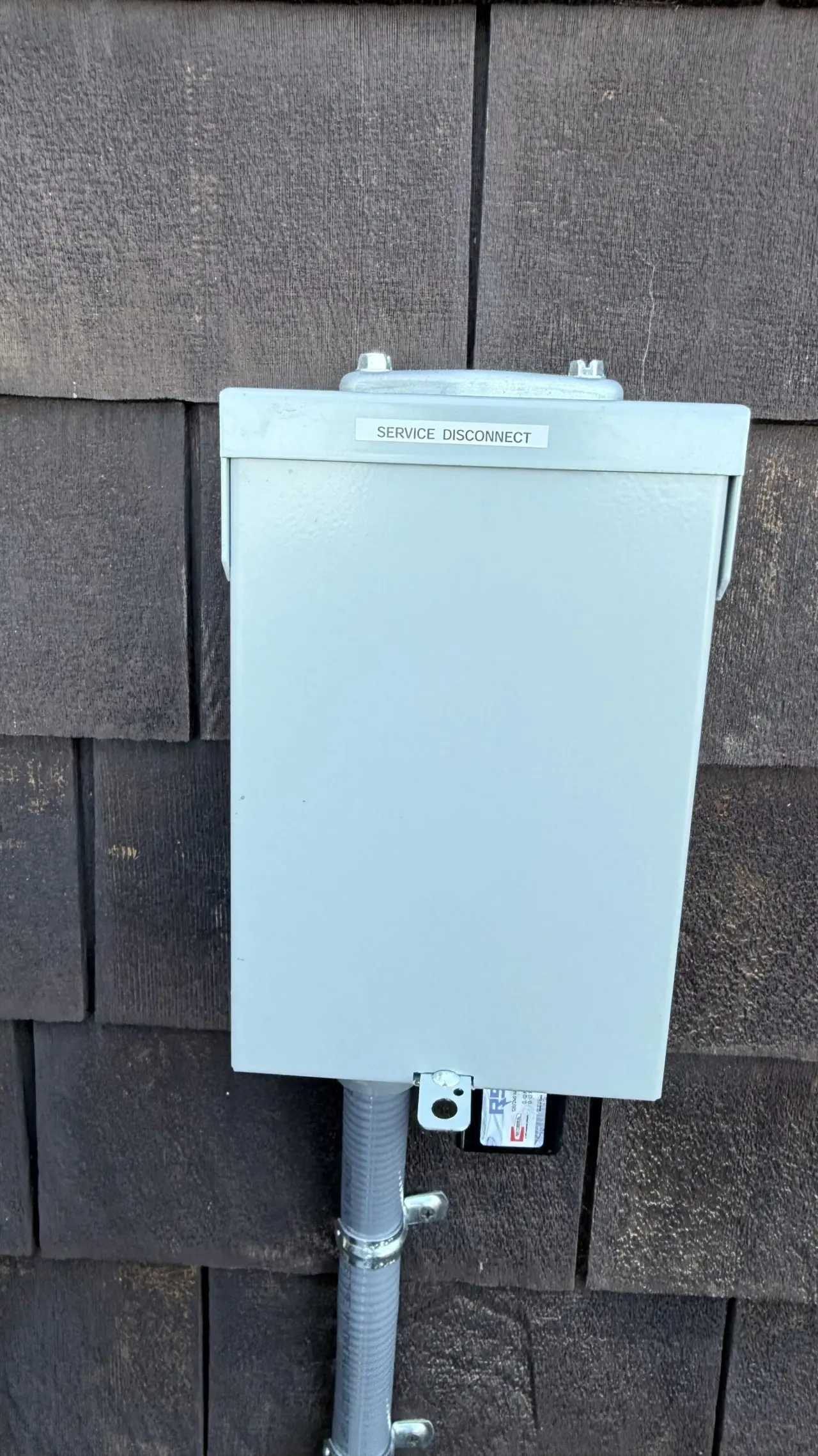 New service disconnect box installed for the heat pump system, San Francisco