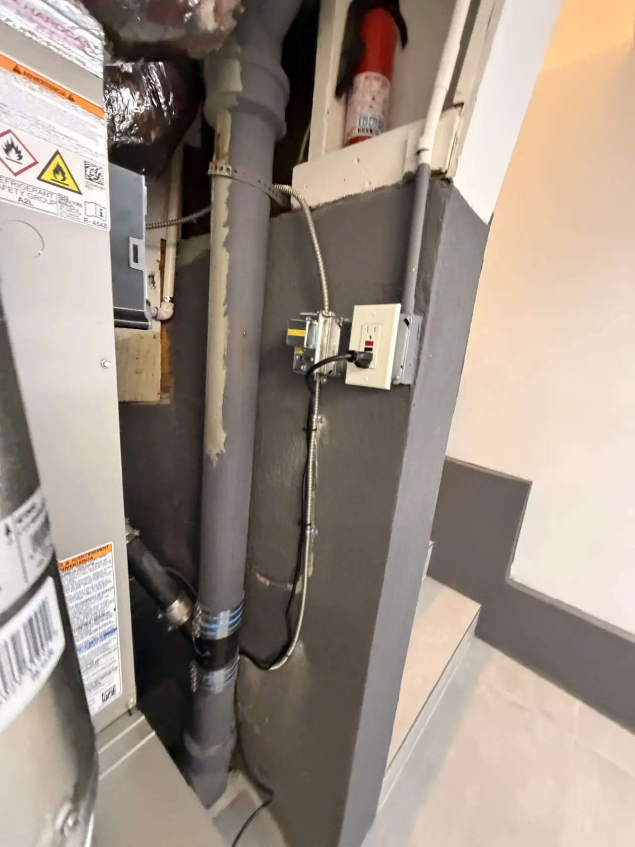 Condensate line and electrical whip for the new Carrier heat pump system in San Francisco