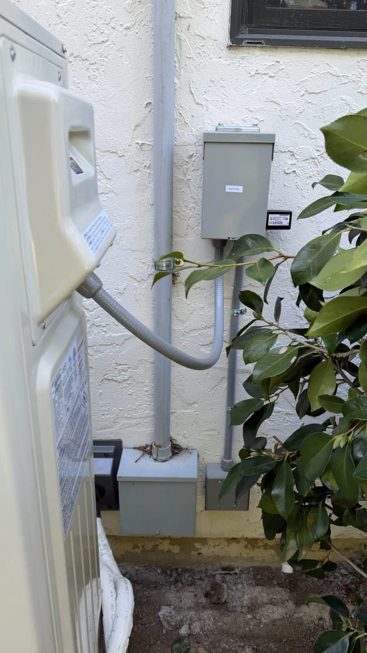 New electrical disconnect and load management wiring for heat pump system in Hillsborough