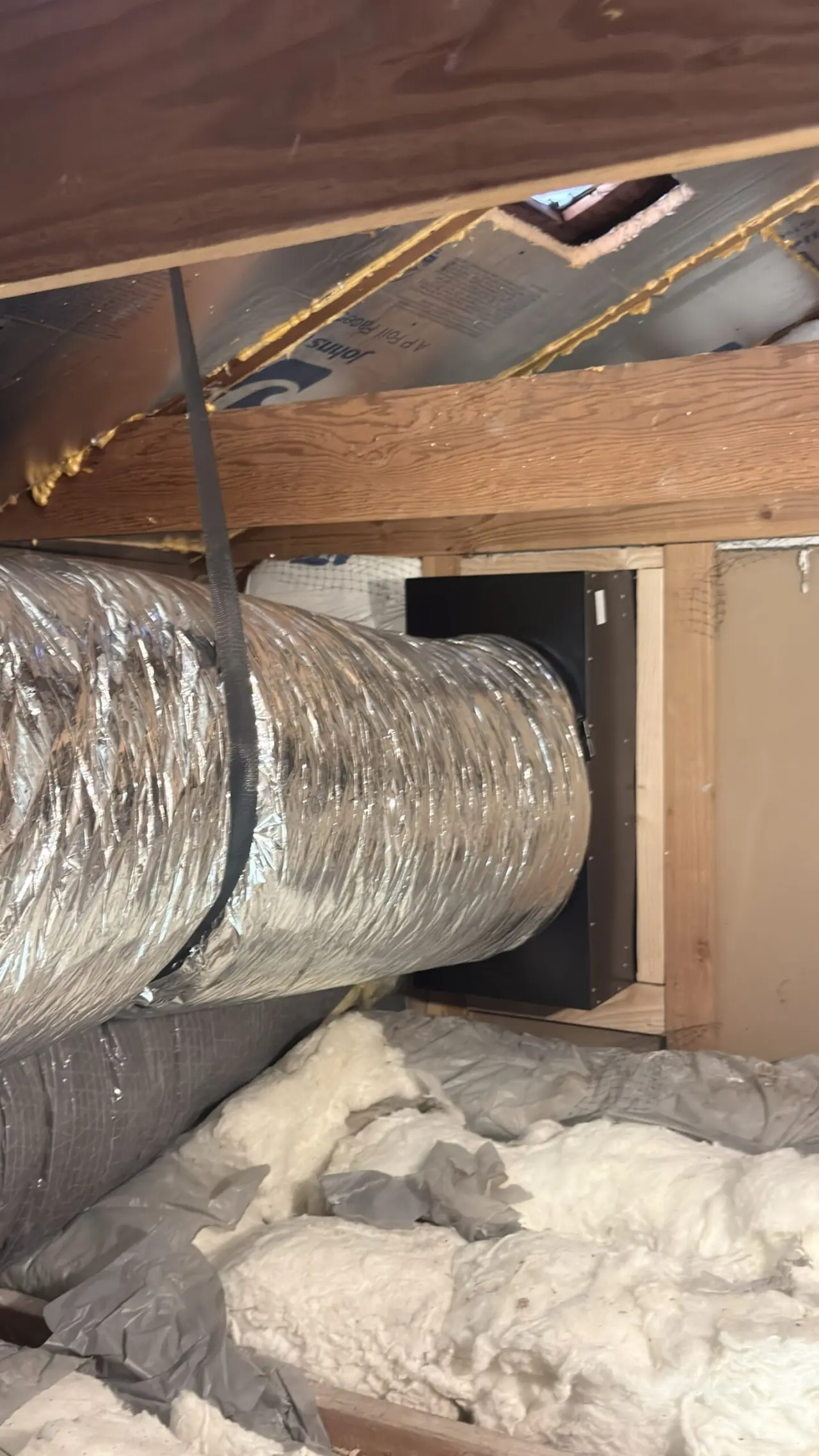 New whole house fan housing and insulated ducting installed in a Los Altos attic