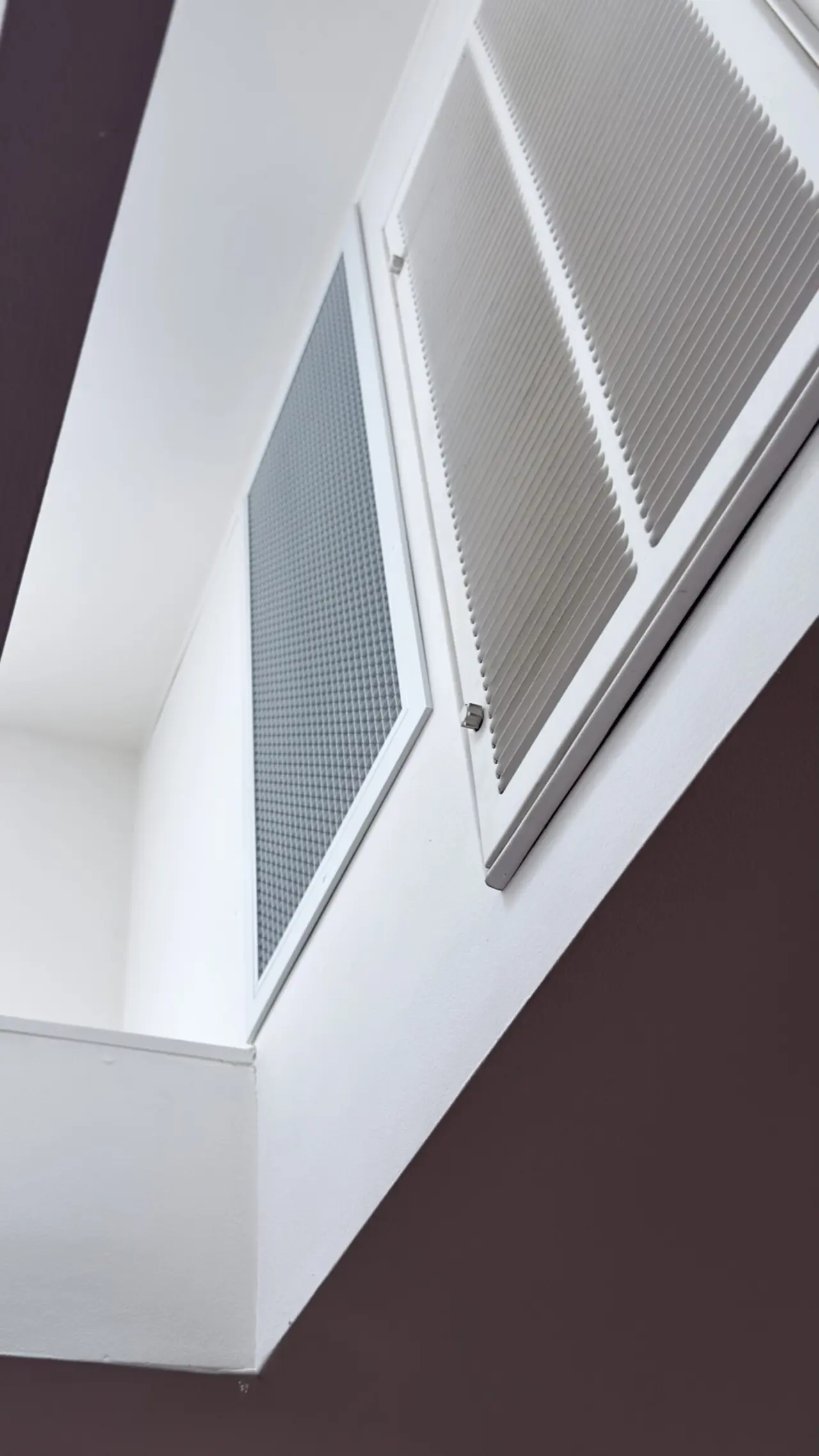Ceiling intake grille for a new whole house fan installed in a Los Altos home