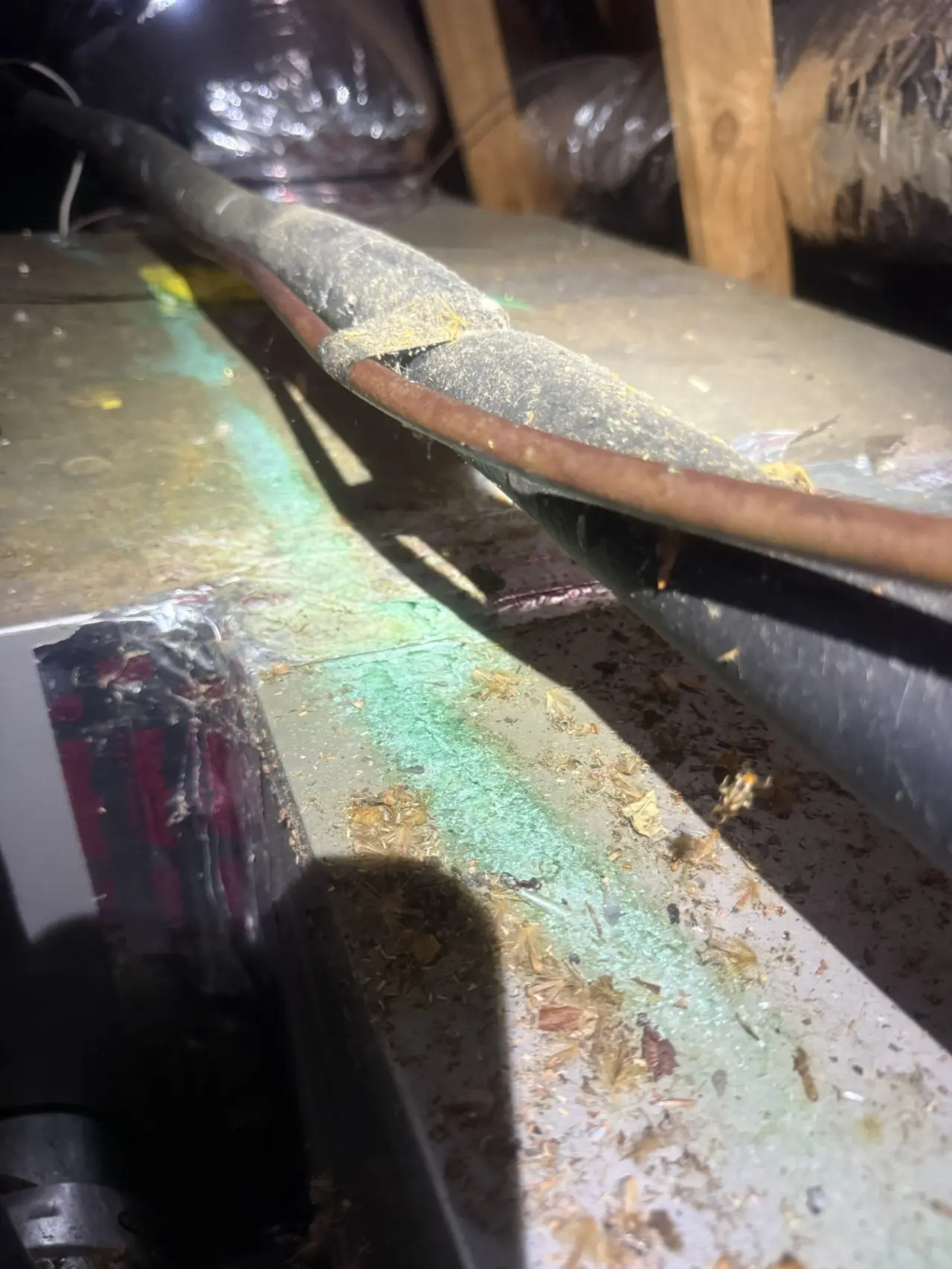 Refrigerant line set in the attic during AC filter drier replacement in Santa Clara
