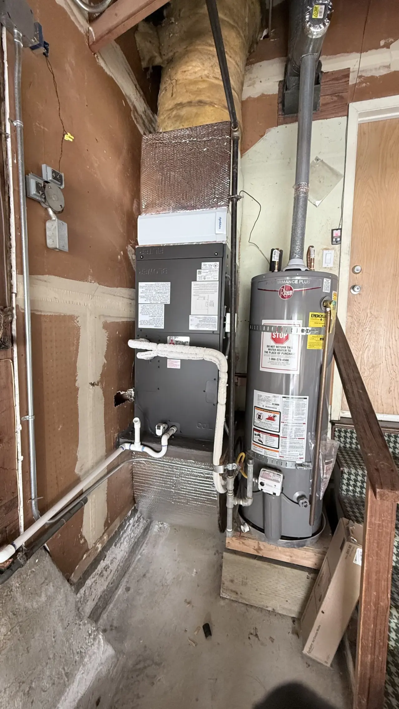 Mitsubishi air handler with insulated duct transitions and condensate drain in San Mateo