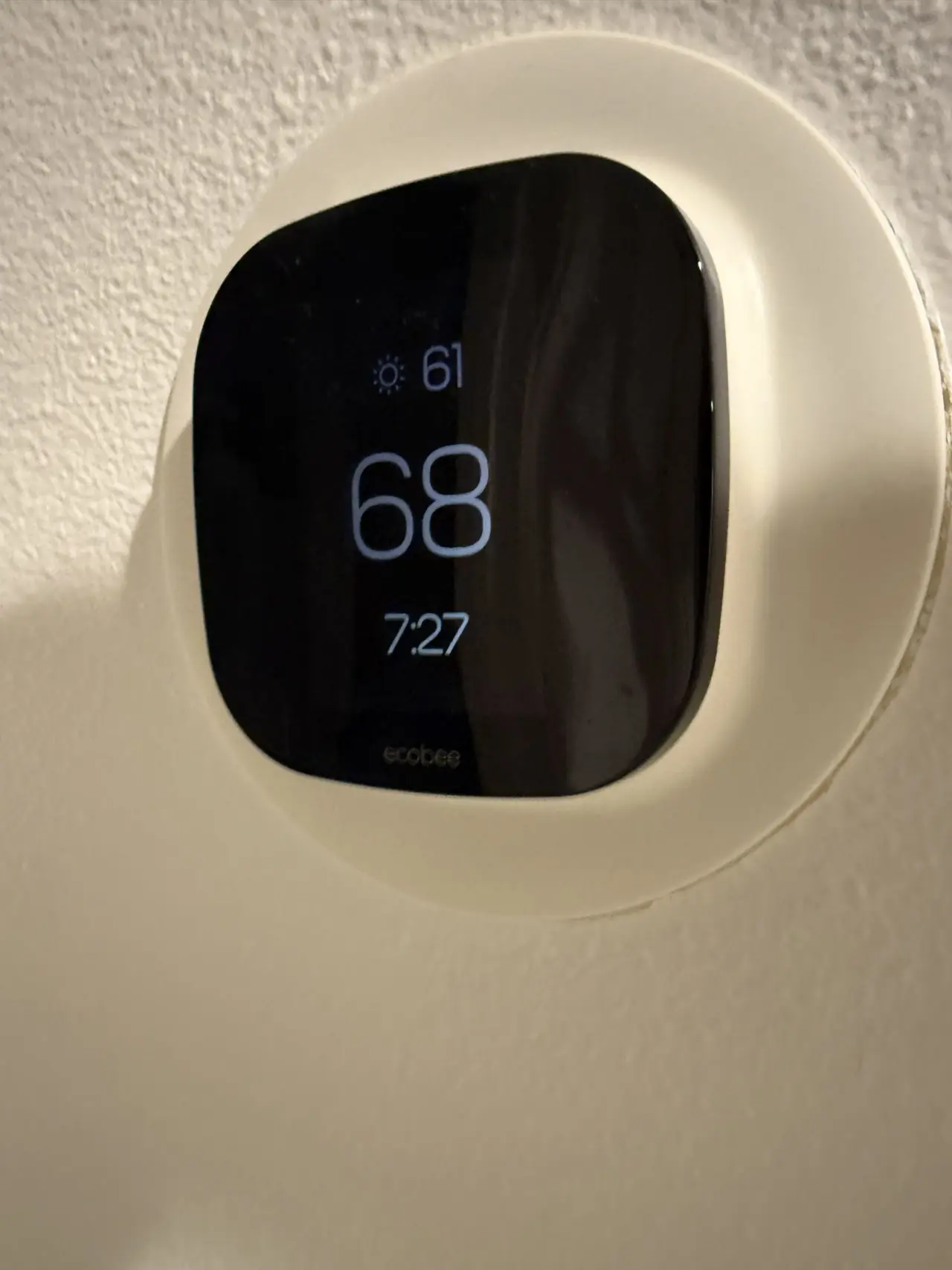 ecobee wall thermostat controlling the new Mitsubishi heat pump system in a South San Francisco home